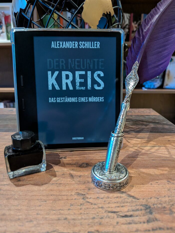 Alexander Schiller: Der neunte Kreis - Das Geständnis eines Mörders. Das Cover ist schlicht schwarz mit dem Titel. Auf dem Bild ist ein Kindle mit dem Cover zu sehen, davor eine Schreibfeder und ein Tintenfass.